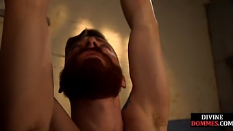 A Voluptuous Female Dominant Uses A Strapon To Penetrate The Submissive'S Rear After A Whipping Session